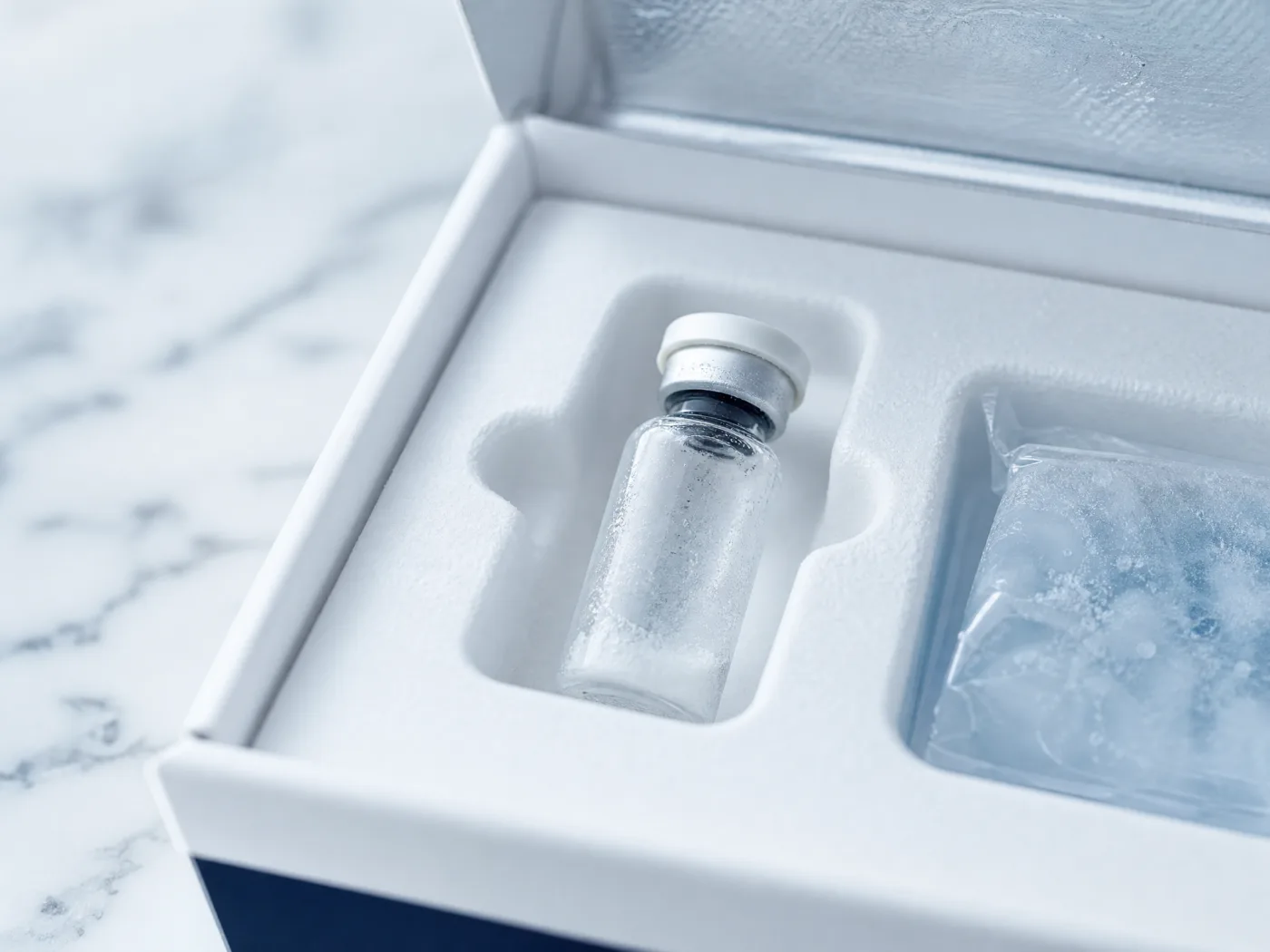 The vial, protected